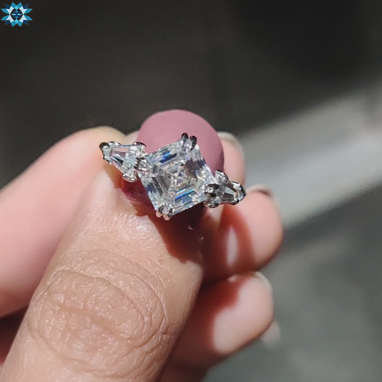Custom ring featuring under halo moissanite and baguette stones.
