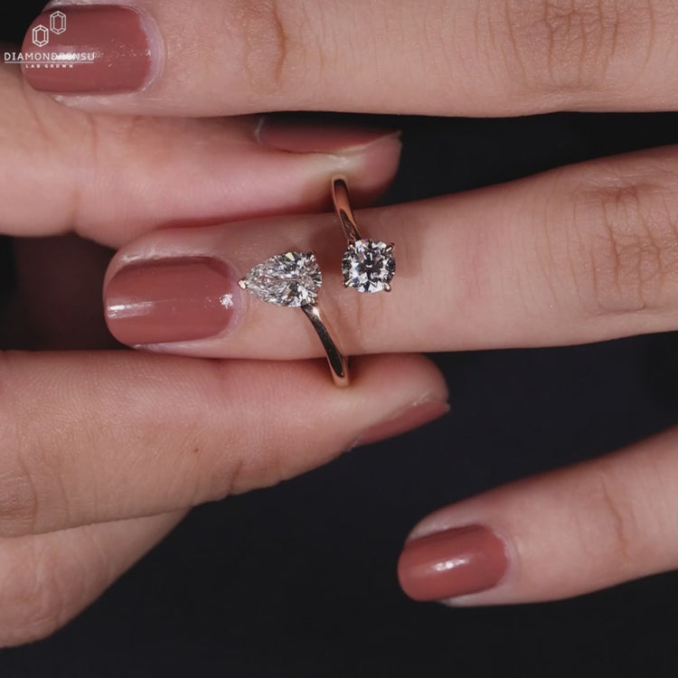 Handmade ring in bypass setting engagement ring style with IGI certified round cut diamond.
