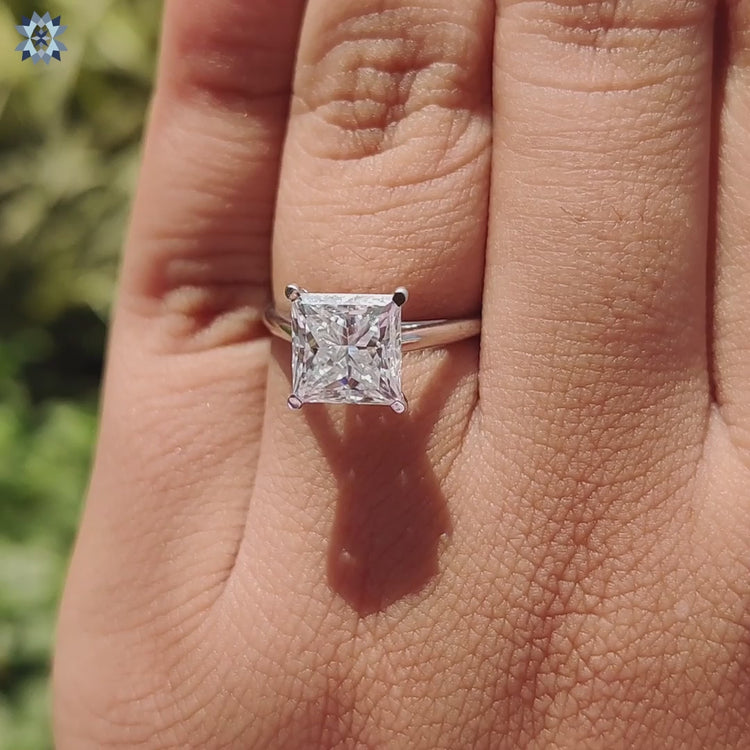 Princess cut solitaire ring made with care using handcrafted detailing and durable materials.
