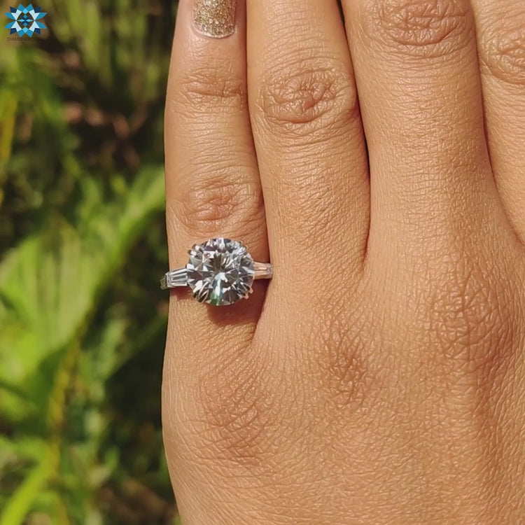 Handmade jewelry featuring round and tapered moissanites.
