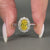 Canary yellow oval diamond ring in white gold.
