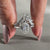 Hexagon step cut ring crafted with a bold compass prong setting.
