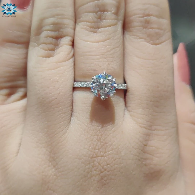 Handmade jewellery featuring octagon moissanite center stone.

