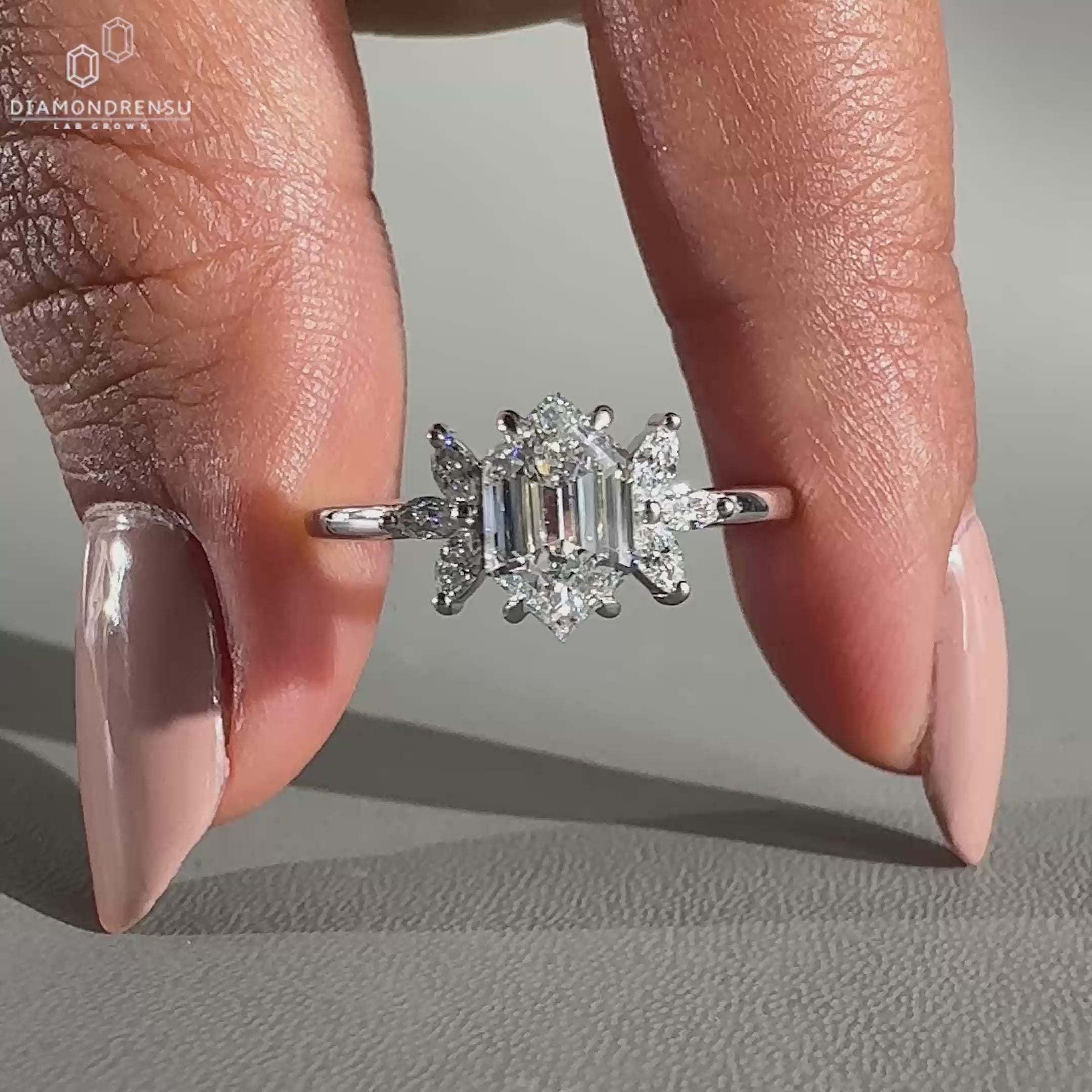 Marquise diamond side stones set in 7 stone ring.
