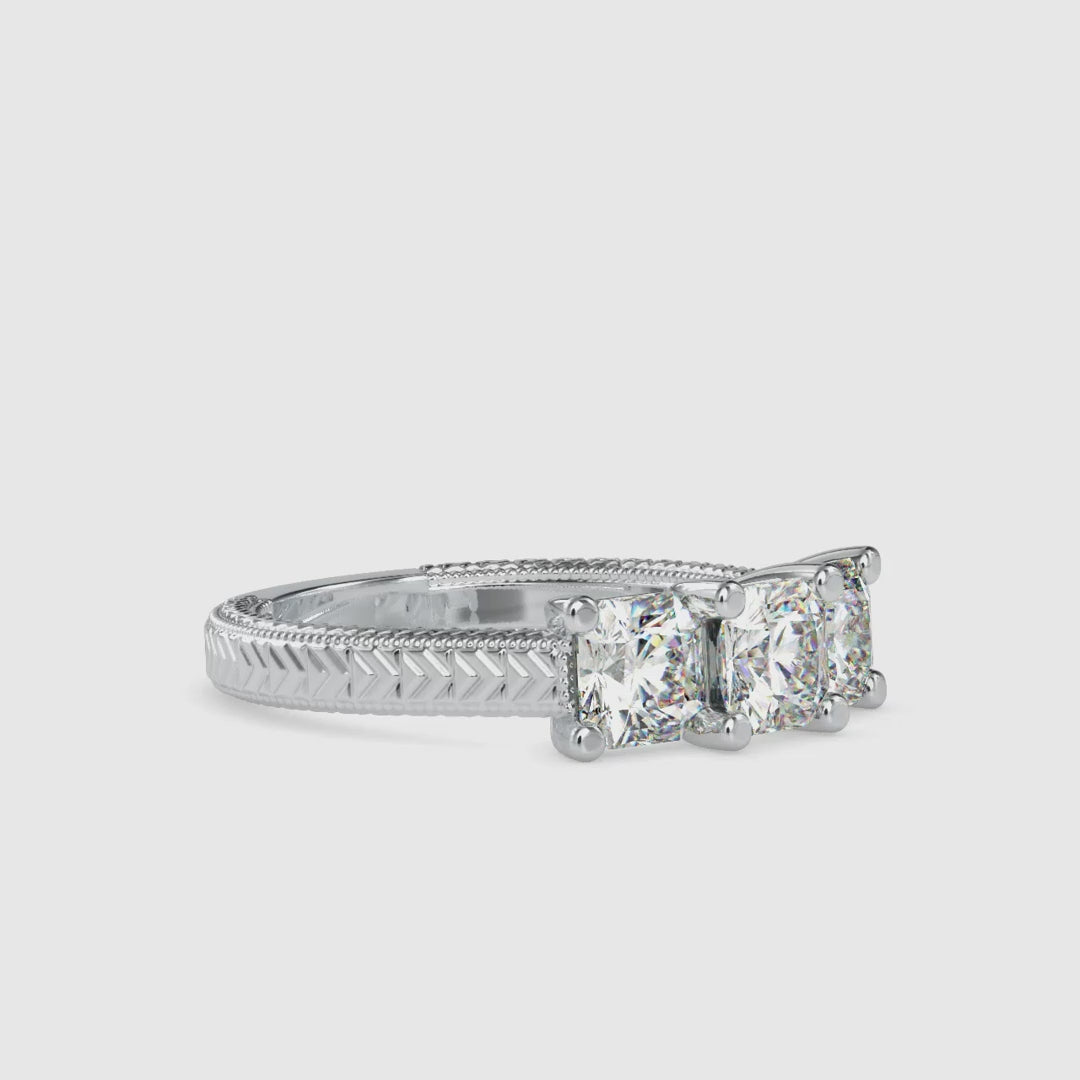 Round diamond three stone engagement ring in 4 prong setting.
