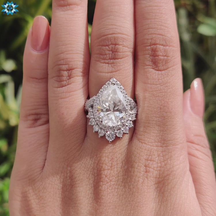 White gold crossover pave ring with moissanite.

