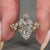Round Cluster Style crafted in yellow gold engagement ring.
