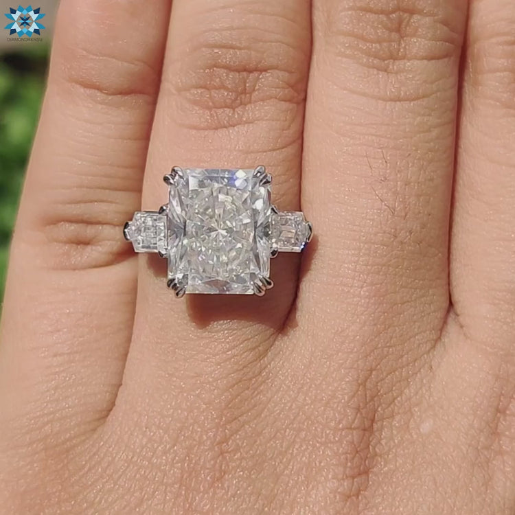 Prong setting moissanite ring in classic 3 stone layout.
