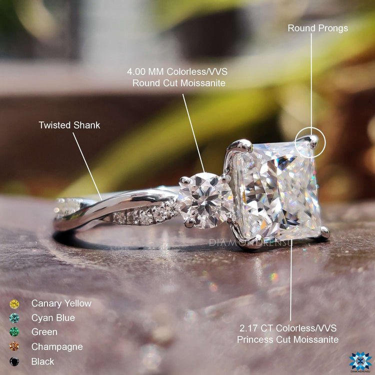 Custom ring with twisted band and side stones.
