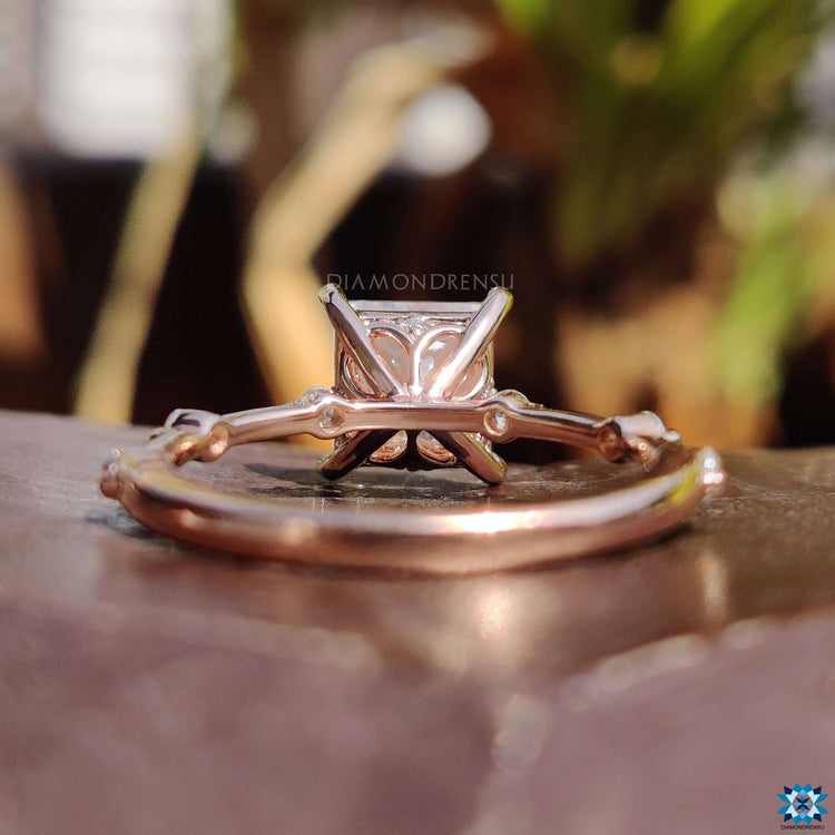 Round cut pave band with princess cut moissanite.
