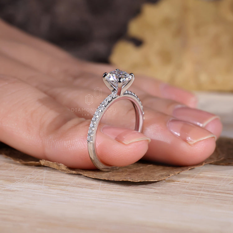 Elegant round cut pave engagement ring for timeless beauty.