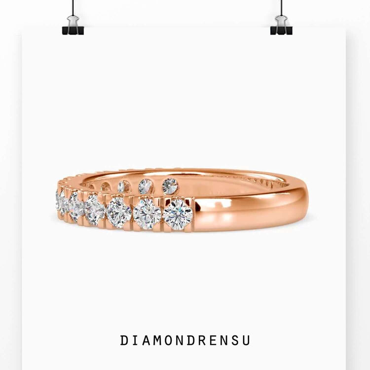Round diamond half eternity band in gold finish.
