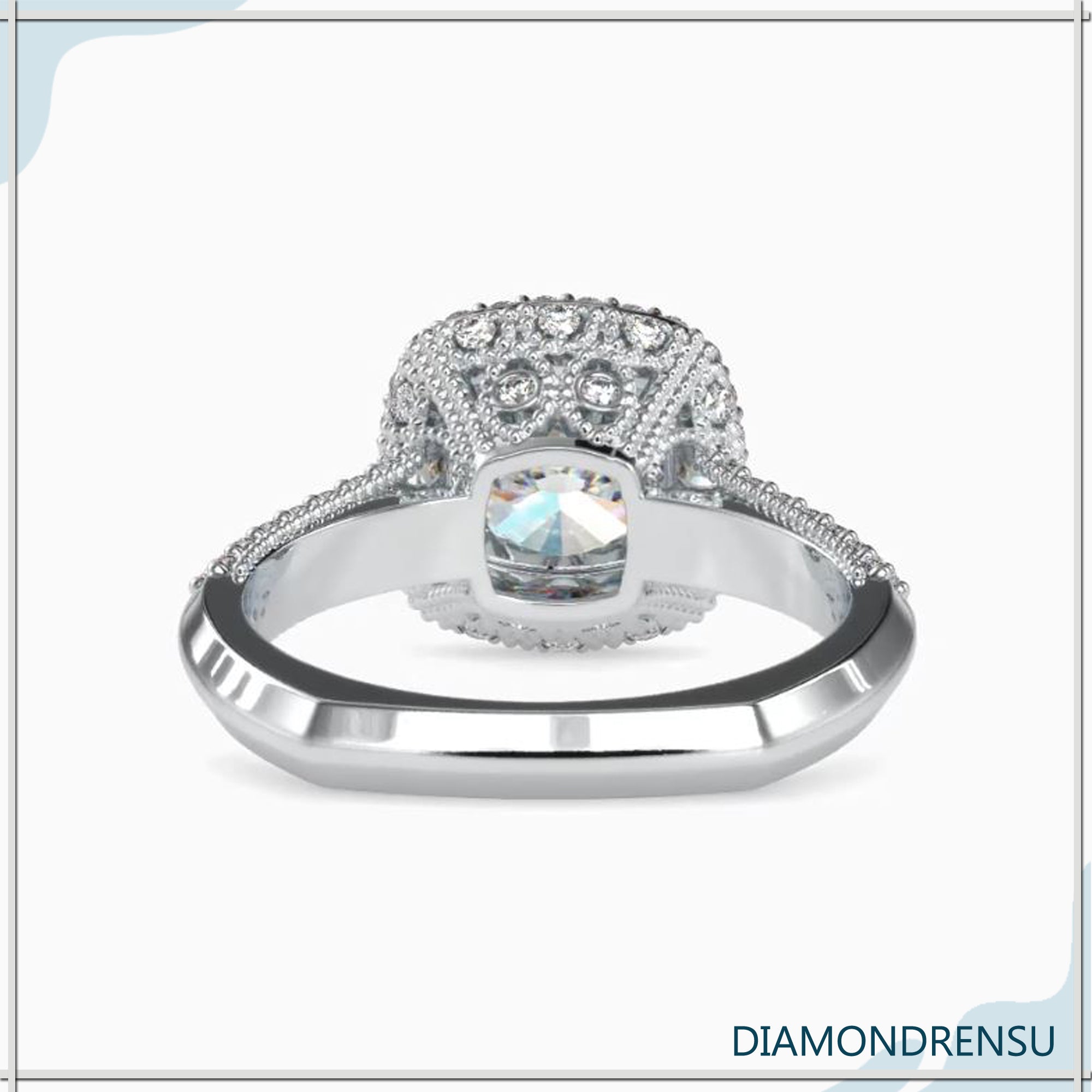 Exquisite diamond ring cushion cut with halo in a euro shank engagement ring setting.