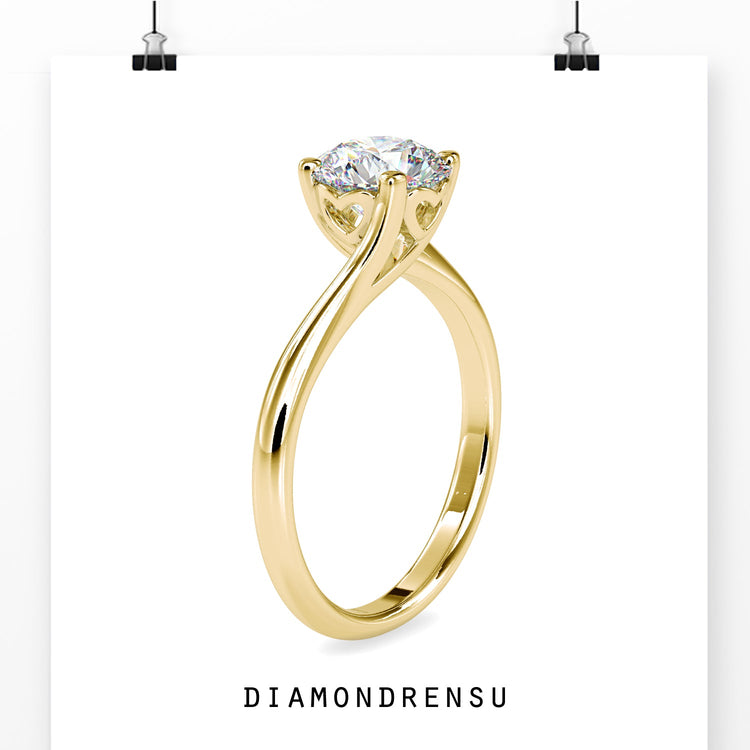 Buy diamond ring in UK with handmade bypass style.
