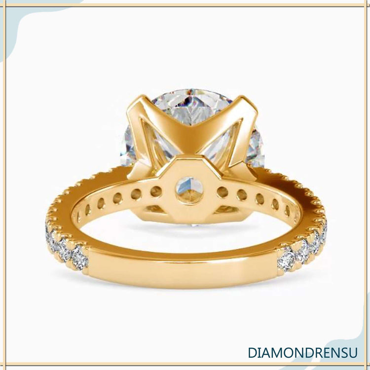 UK engagement ring with custom tab prong design.
