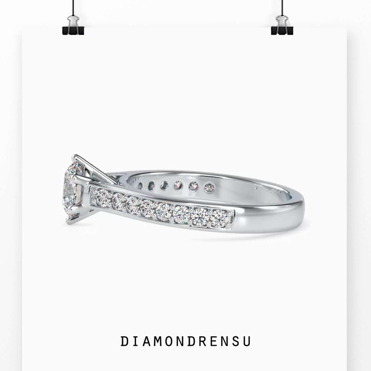 White gold engagement ring with IGI certified round diamond.
