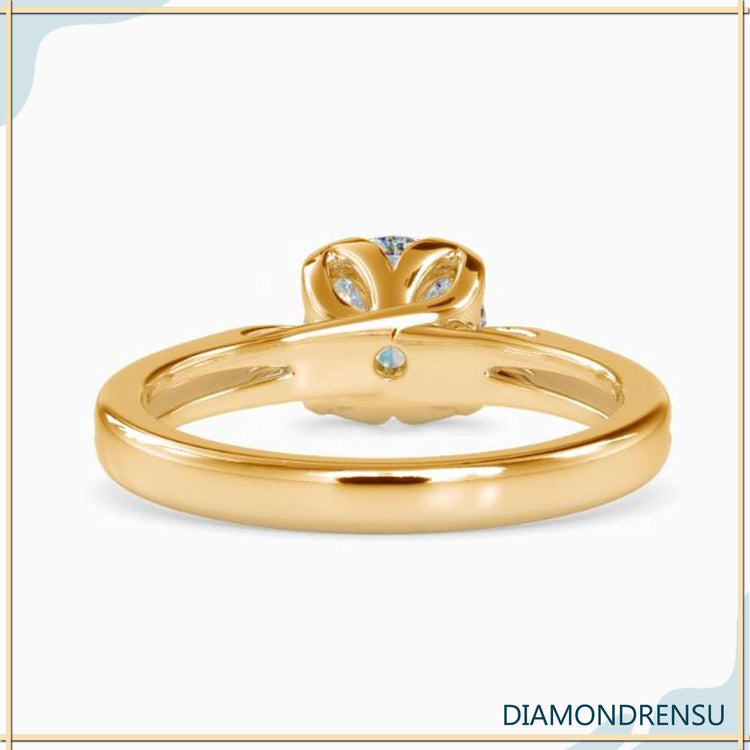 Cathedral ring style with round cut lab grown diamond.
