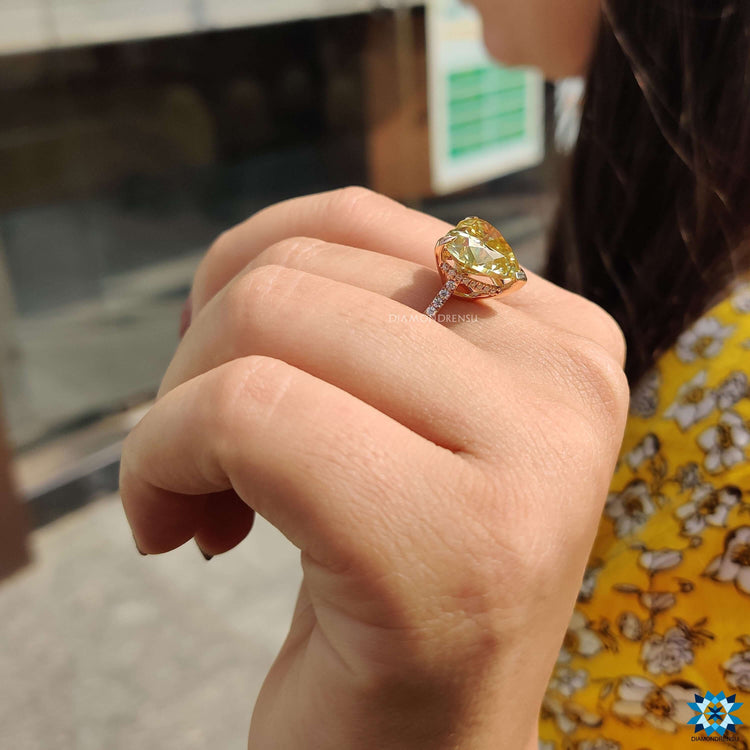 Handmade moissanite engagement ring in rose gold.
