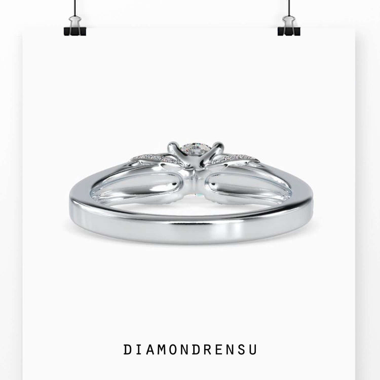 Lab grown diamond ring with 7 stone design and round prong setting.
