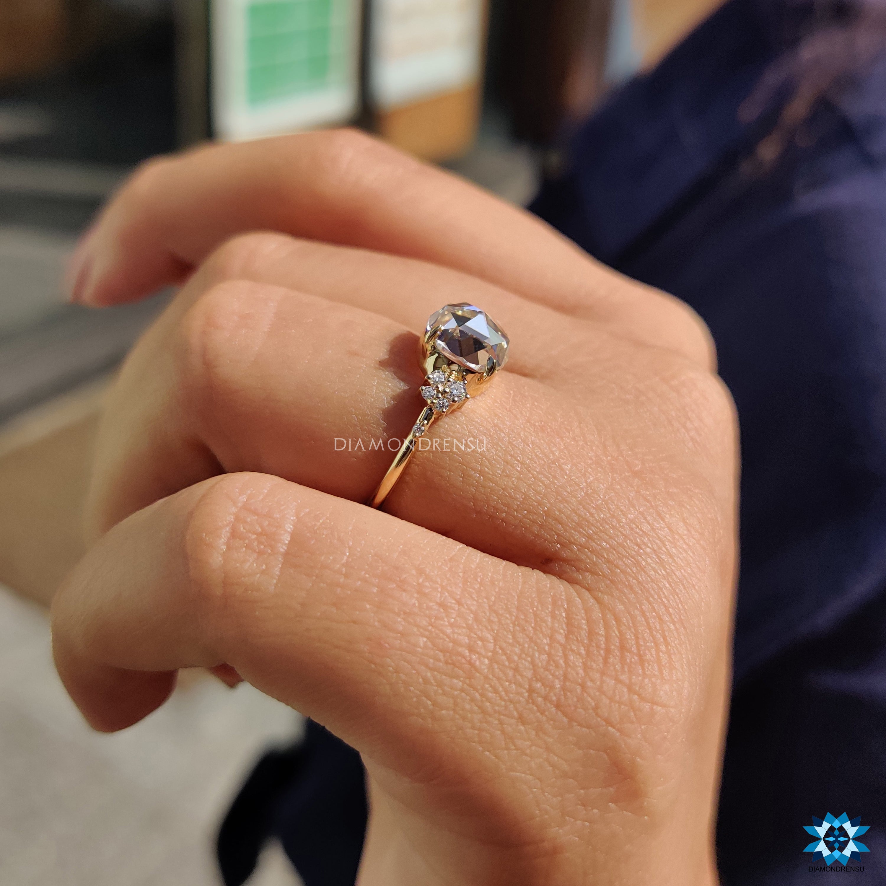 Handmade jewellery featuring rose cut moissanite in yellow gold.
