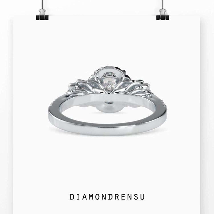 UK engagement ring featuring lab grown diamond and flower motif.
