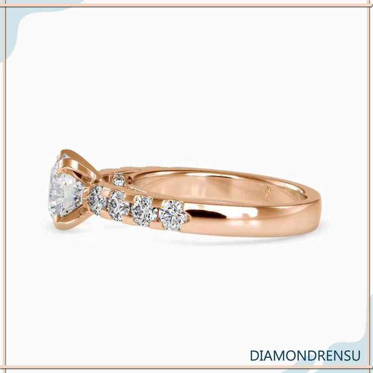 Round cut pave ring in rose gold with handmade band.
