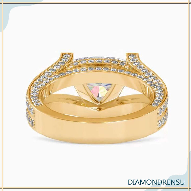 Handmade ring featuring trillion cut and split shank.
