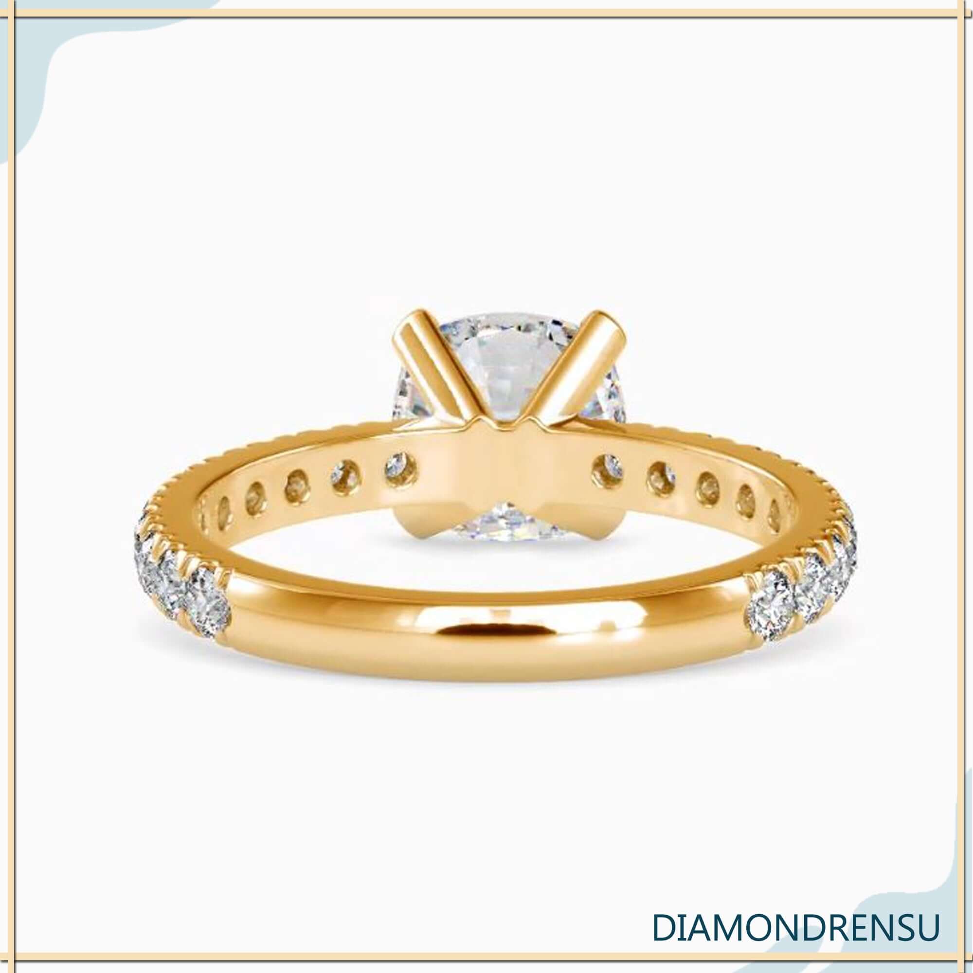 Diamondrensu cushion cut engagement ring with a 3 carat cushion cut diamond and pave ring setting.
