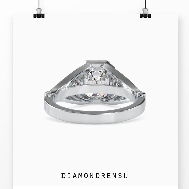 Bezel setting ring with lab grown emerald centre diamond.

