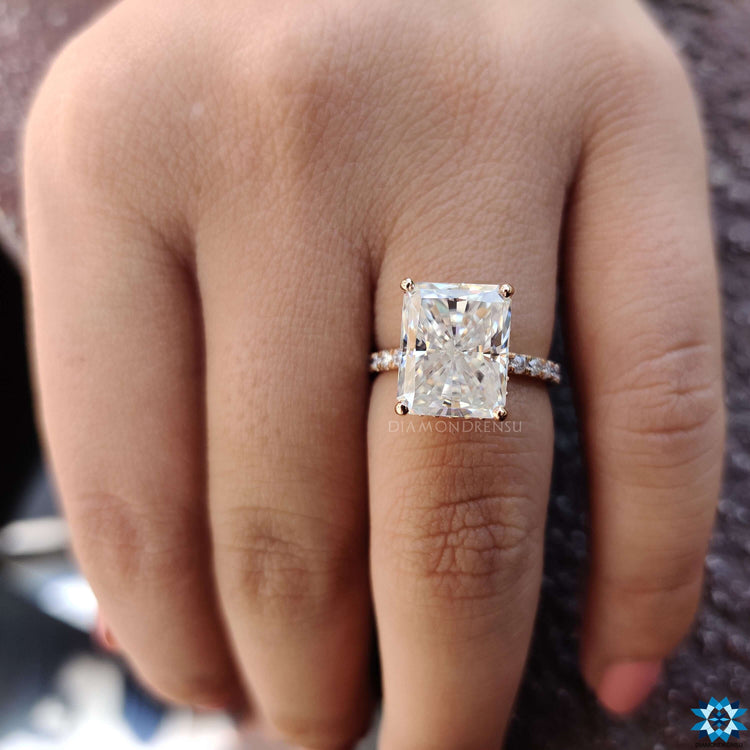 Pave setting ring featuring round cut pave band.
