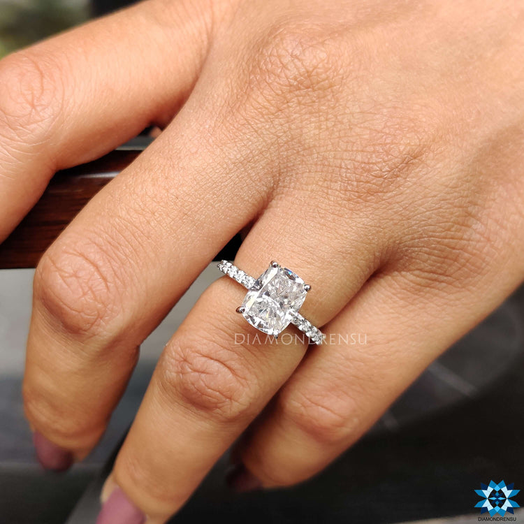Handmade jewelry featuring elongated cushion cut moissanite.
