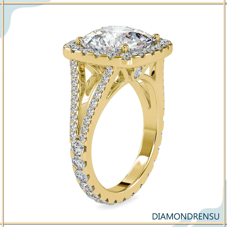 Split shank diamond ring with four round prong setting.
