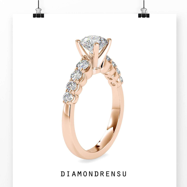 Handmade engagement ring in rose gold with round brilliant lab diamond.
