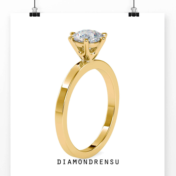 Custom engagement ring featuring round lab diamond centre.
