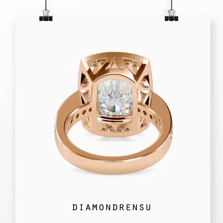 Round cut pave band ring with elongated cushion diamond.
