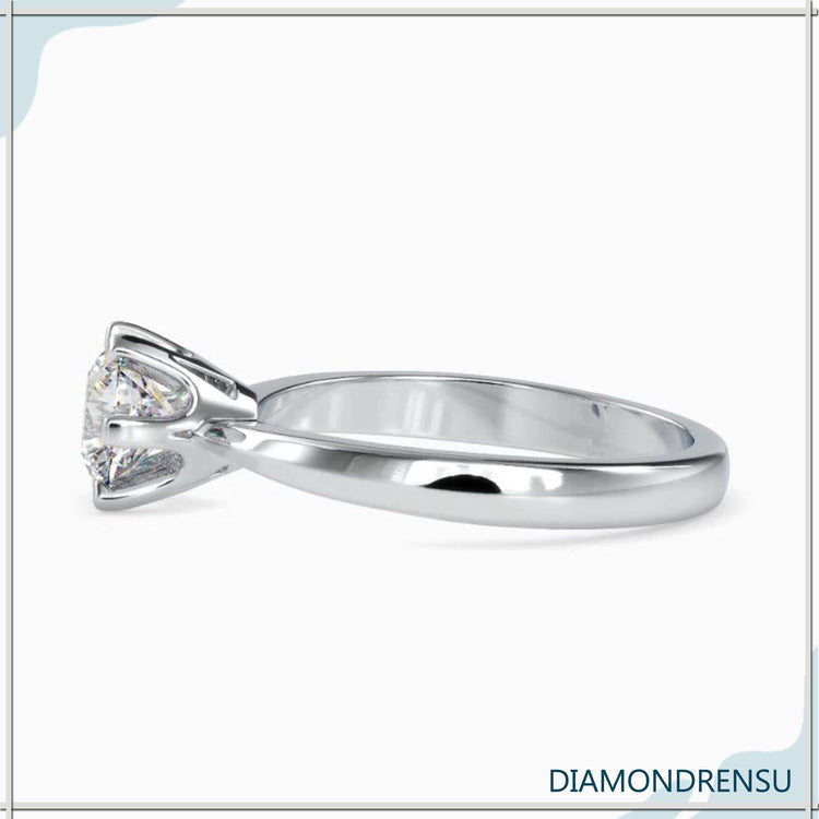 Buy diamond ring with solitaire setting and handmade design.
