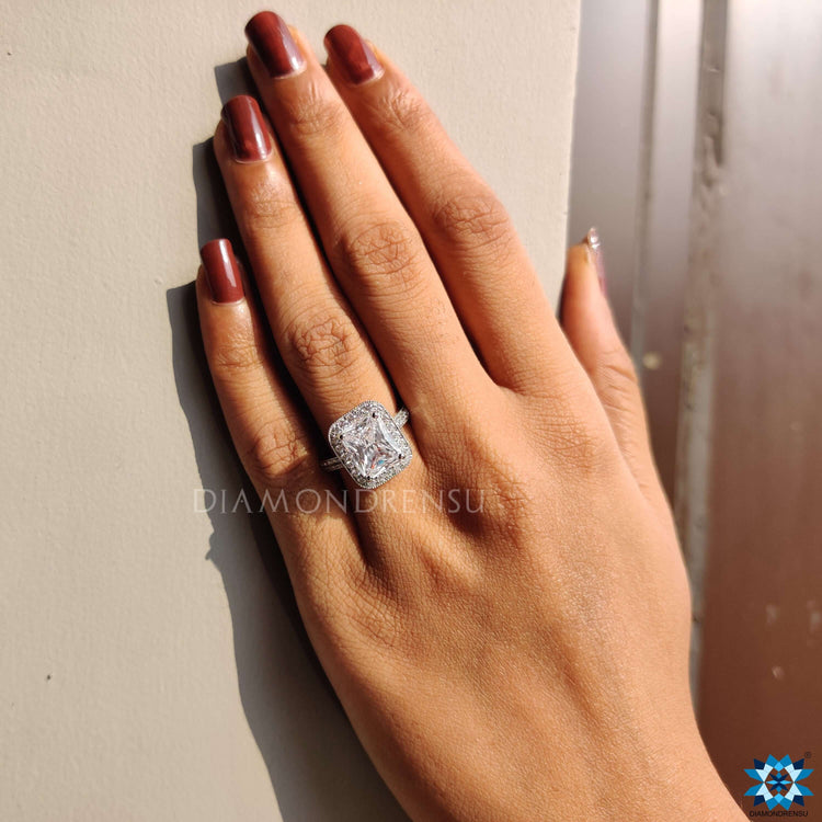 Custom engagement ring with radiant cut stone.
