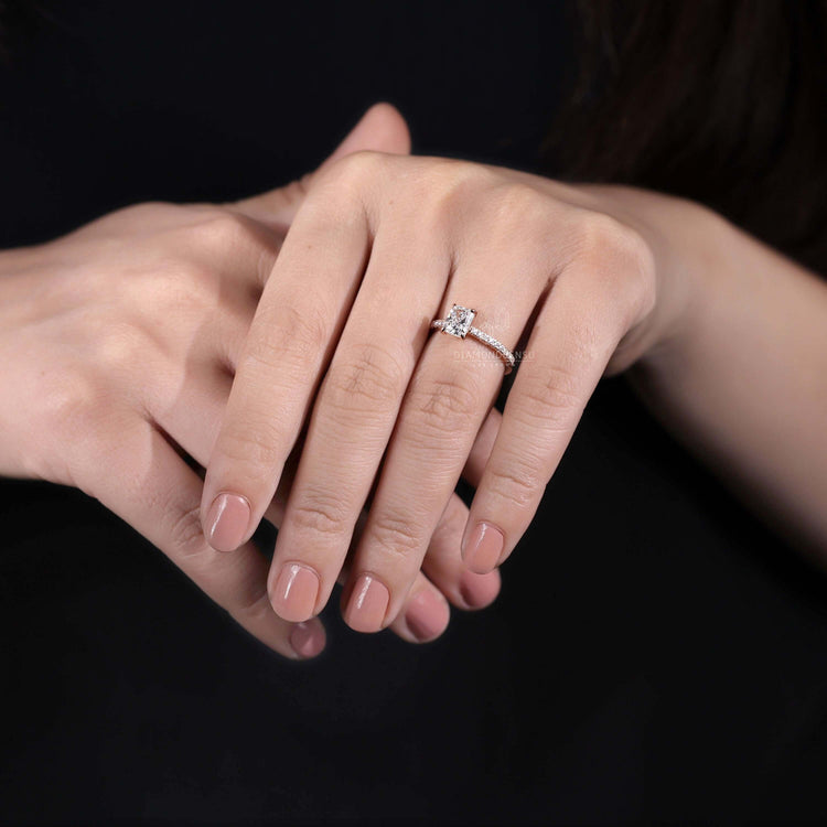 Radiant cut diamond ring featuring a 4 prong claw setting
