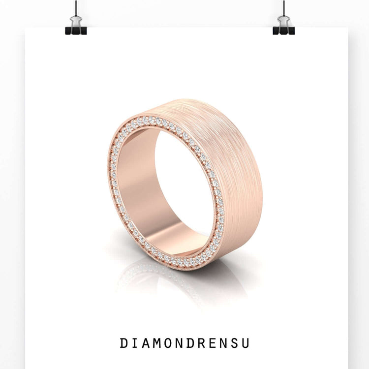 Round cut diamond set in rose gold men wedding band.
