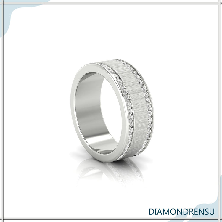 Mens wedding band in channel setting with eternity style.

