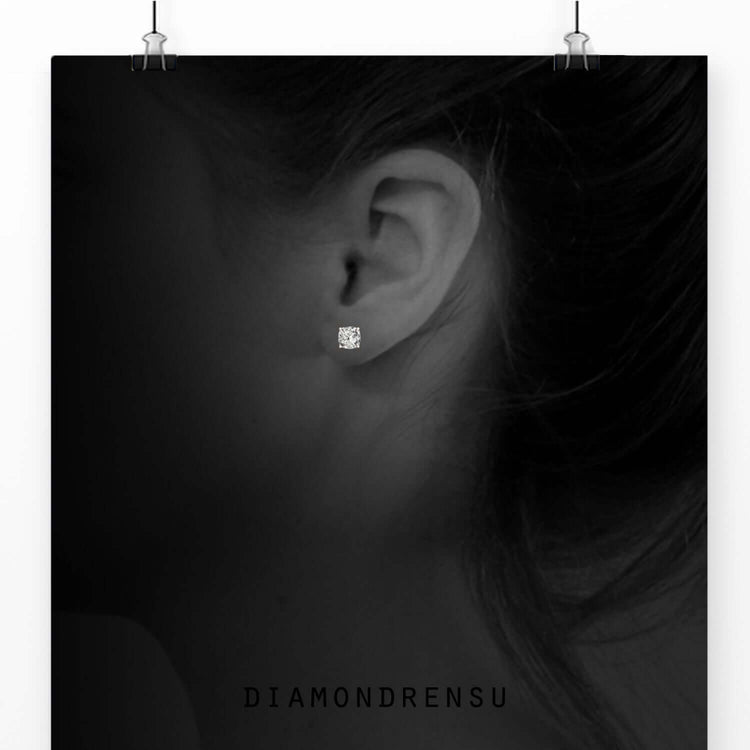 Stud earrings crafted with lab grown cushion diamonds.
