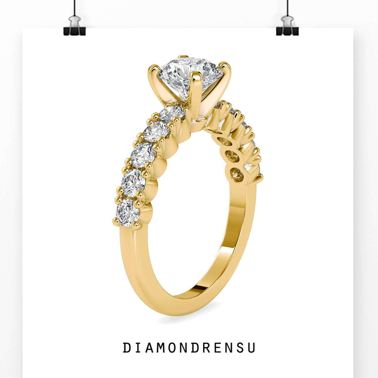 Rose gold engagement ring with tab prong and round pave setting.

