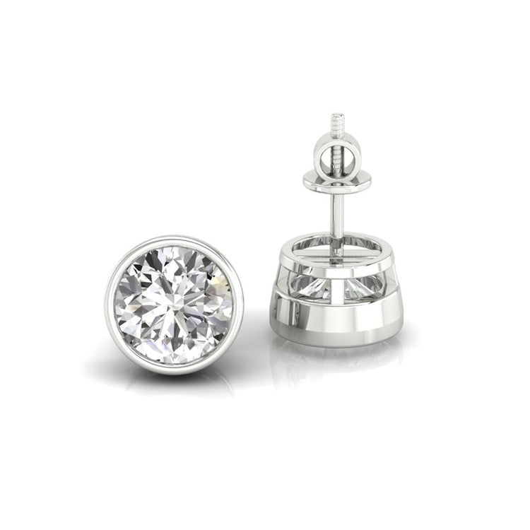 Handmade jewellery showcasing round diamond bezel set stud earrings.
