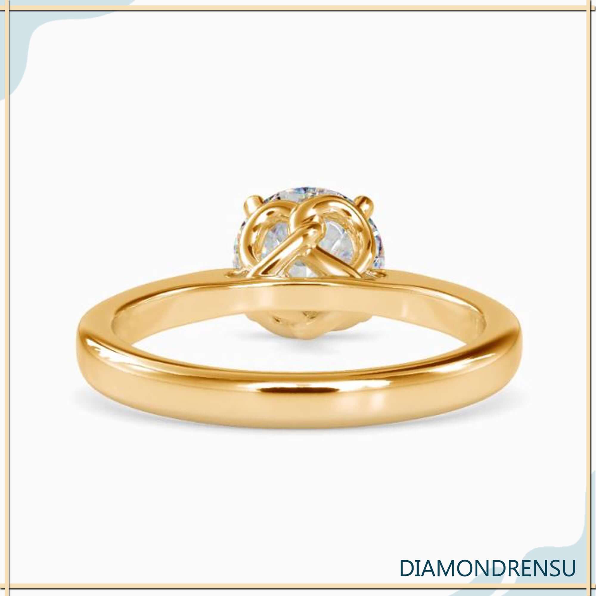 Elegant diamondrensu ring featuring a twisted prong setting and lab grown diamond.