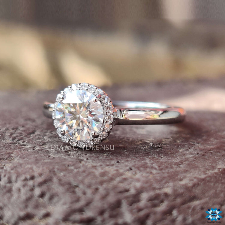 Custom white gold ring with round cut moissanite.
