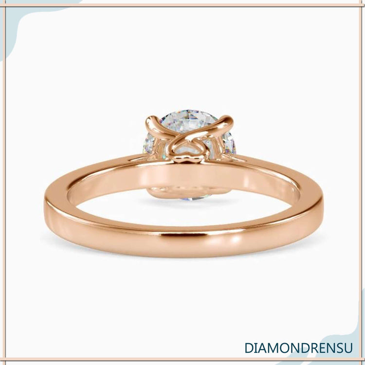 Simple diamond ring with round solitaire, perfect for UK buyers.
