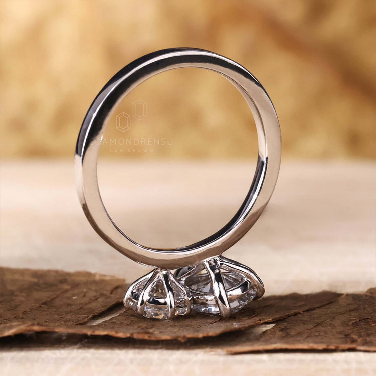 Cushion ring crafted with a claw prong setting, perfect as a minimalist engagement ring for a sleek and stylish look.
