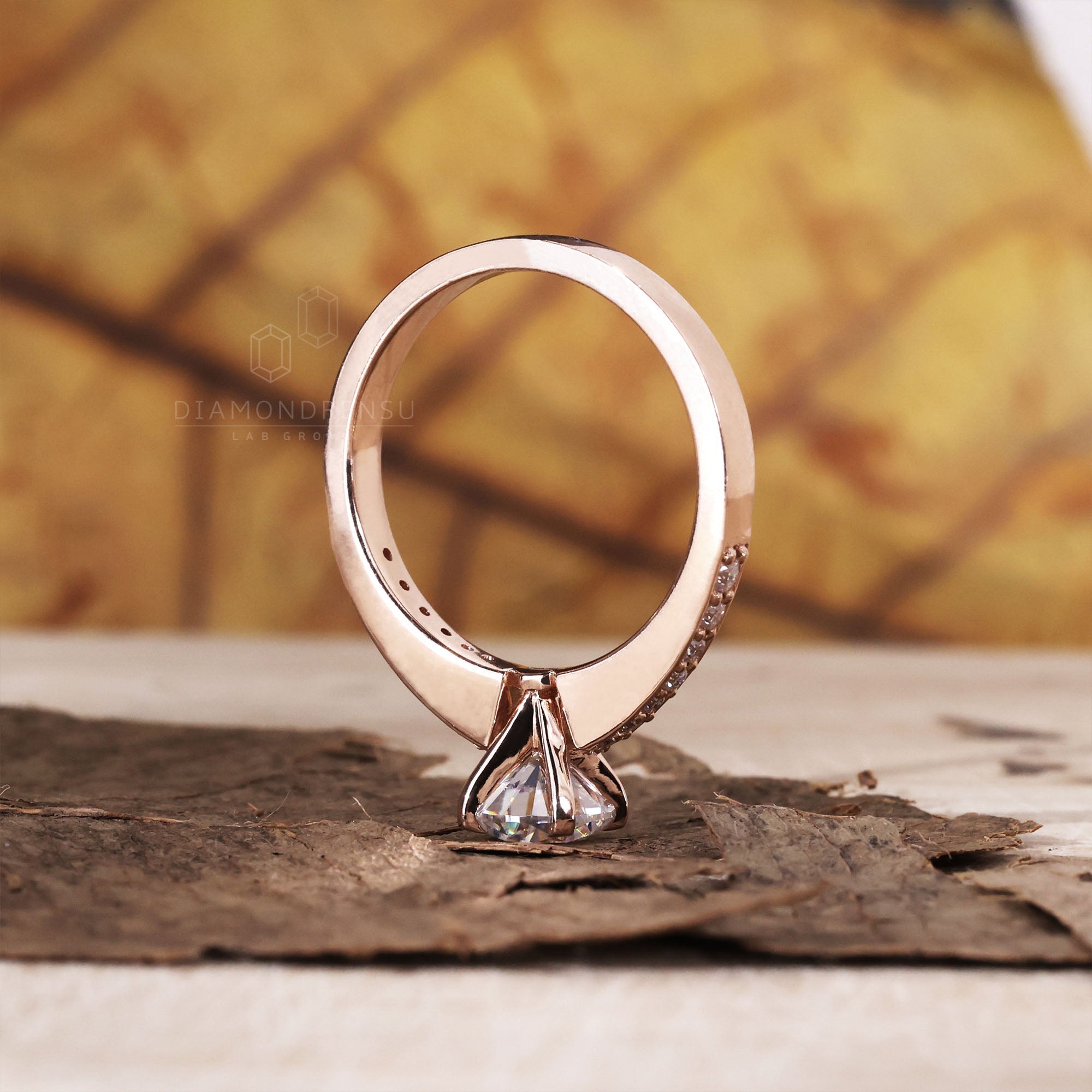 Handcrafted round brilliant cut diamond ring in a prong setting.