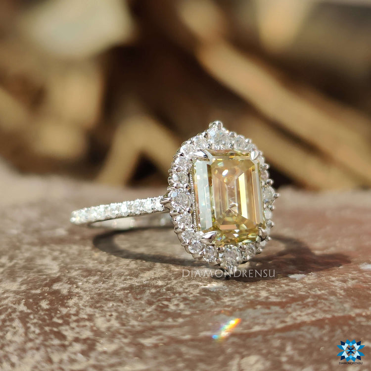 Vintage style engagement ring with canary yellow moissanite.
