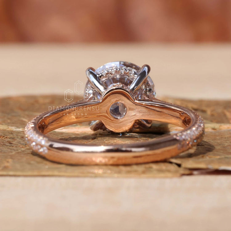 Engagement ring hidden halo crafted to enhance the diamond's shine.